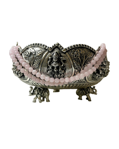 Basket with rose quartz handle